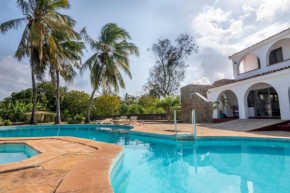 Diani 4 Bedroom Villa with a Private Pool, In a serene environment, secure and minutes to the beach.